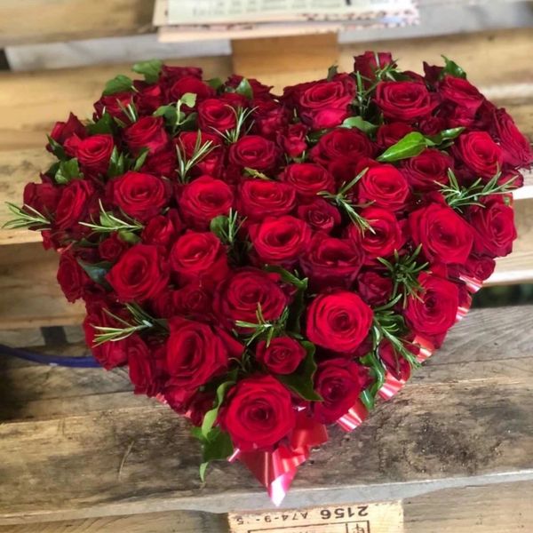 Funeral Flowers - a red rose heart funeral tribute display