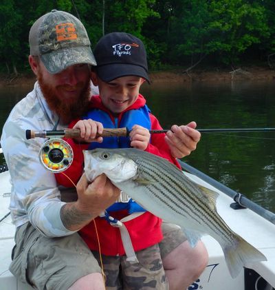 Andy Bates fishing with his son