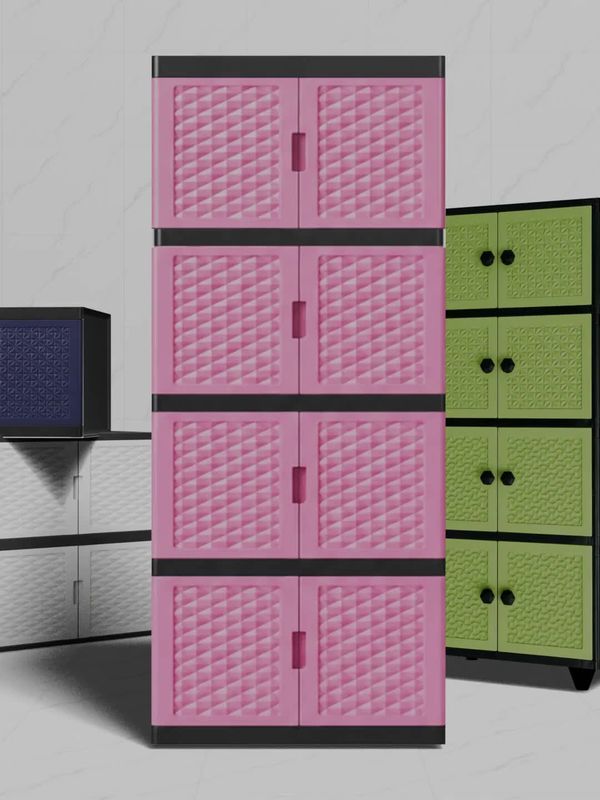 Stacked pink plastic storage cabinets with textured doors in a room.