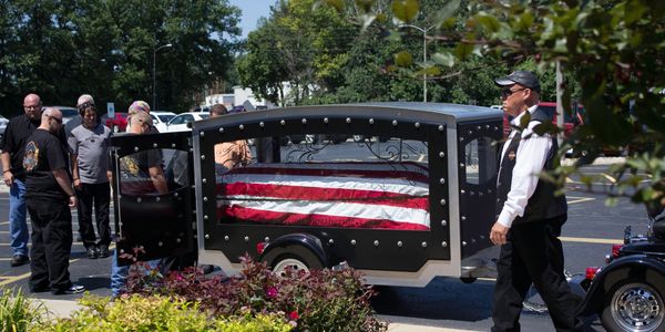 Tanzyus Logan "Remembering the Ride" motorcycle-drawn hearse. Exclusive to Central Illinois.