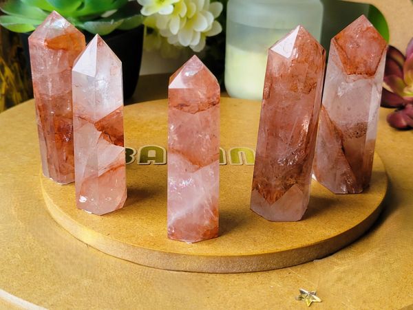 Fire Quartz, or Hematoid Quartz, is a grounding stone that boosts focus, balance, and confidence.