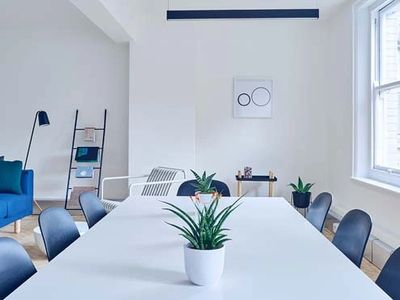 Interior painting and drywall repair in an office