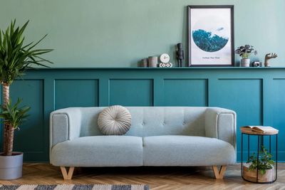 Interior painting with wainscoting, molding, and decorative trim