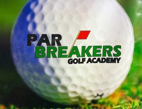Golf ball with Par Breakers Golf Academy logo.