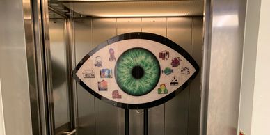 a decorative work of art shaped like an eye