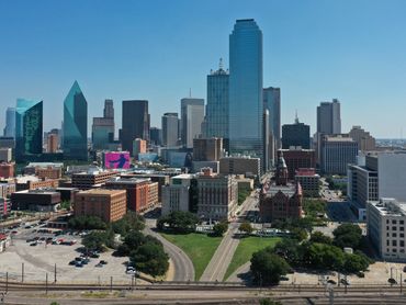Dealey Plaza backdropped by Dallas, Texas