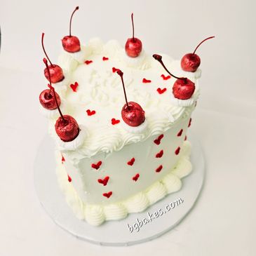 Vintage heart cake with cherries and hearts