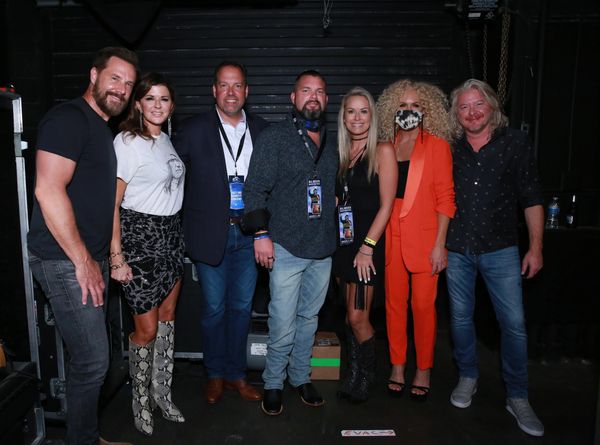 Jacob Schick and his wife Ashley Schick with SRS Distribution CEO, Dan Tinker and Little Big Town.