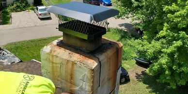 Chimney cap being installed in Loveland Ohio 