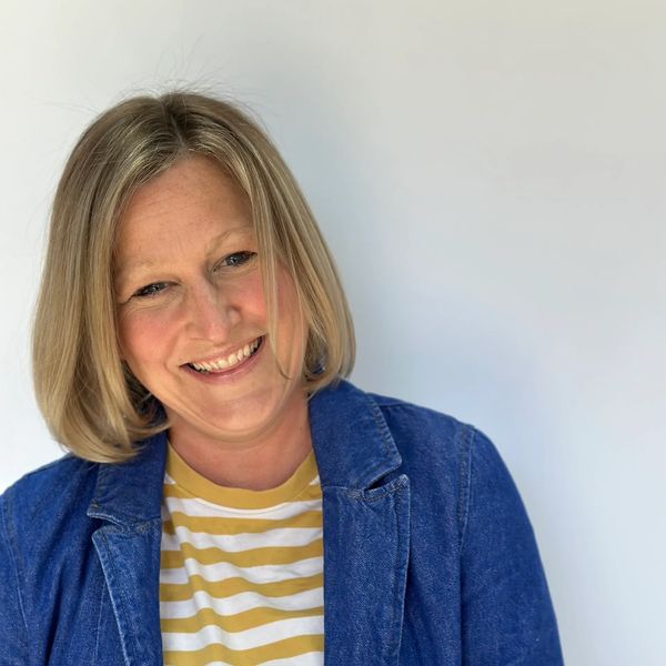 Executive leadership coaching professional coaching. coaching . White woman in stripy t-shirt smiles