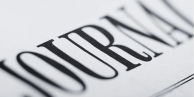 Black and white image of journal headline