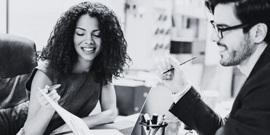 Black and white image of young faculty members