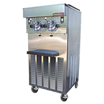 Commercial soft serve ice cream machine with dual dispensing nozzles.