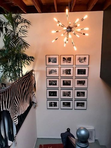 Framed pieces installed in a client's home.