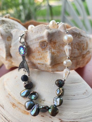 The rendition of the Mermaid Bracelet. Also with Hawaiian Shells and Pearls with silver accents.