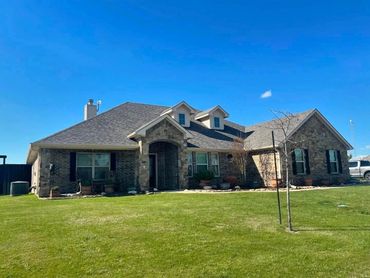 A house that had a new roof put on it.