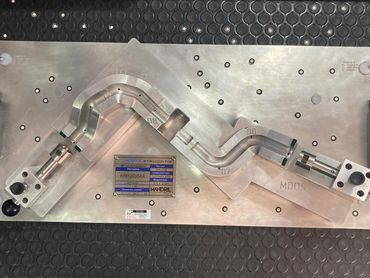 Aluminum check fixture for pipes