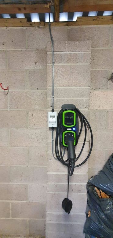 Electric Vehicle Charge point installed in domestic garage.