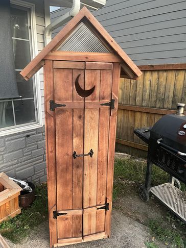 Moon lit outhouse style shed