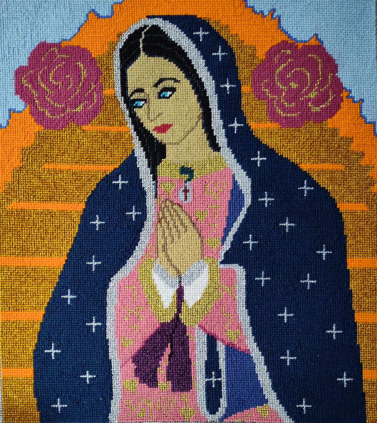 I replaced the flowers on her gown with hearts and the Hebrew names of God.