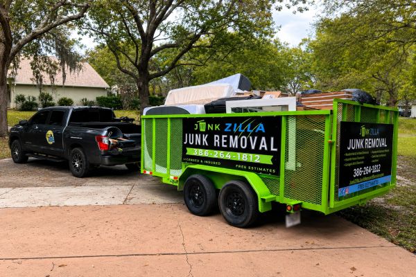 Junk Zilla trailer loaded from a house cleanout in DeLand, FL