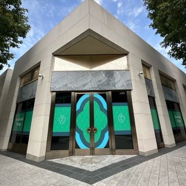 Storefront available for lease with logo in the Buckhead Village District of Atlanta