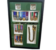 WW1 WW2 medals cleaned and re mounted in a display case, framed