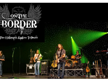 On The Border, an Eagles tribute band, performing on stage with green lighting.