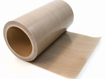 A roll of light brown adhesive or protective film.