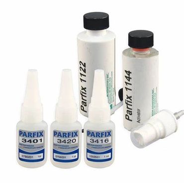 Various Parfix adhesive and activator bottles arranged together.