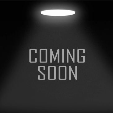 Spotlight on 'COMING SOON' text in dark background.