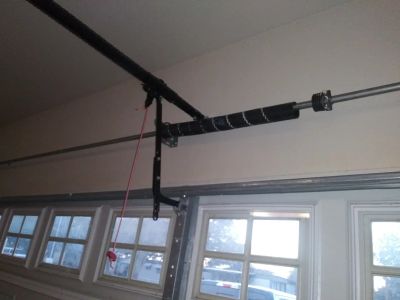 Broken garage door spring in South Austin was replaced same-day
