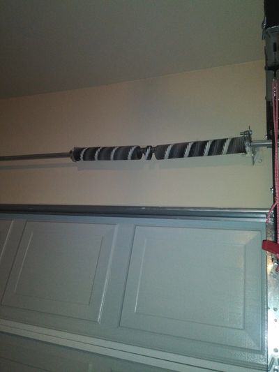 Spring replacement repair is available in and around san Marcos. Broken spring and new garage door.