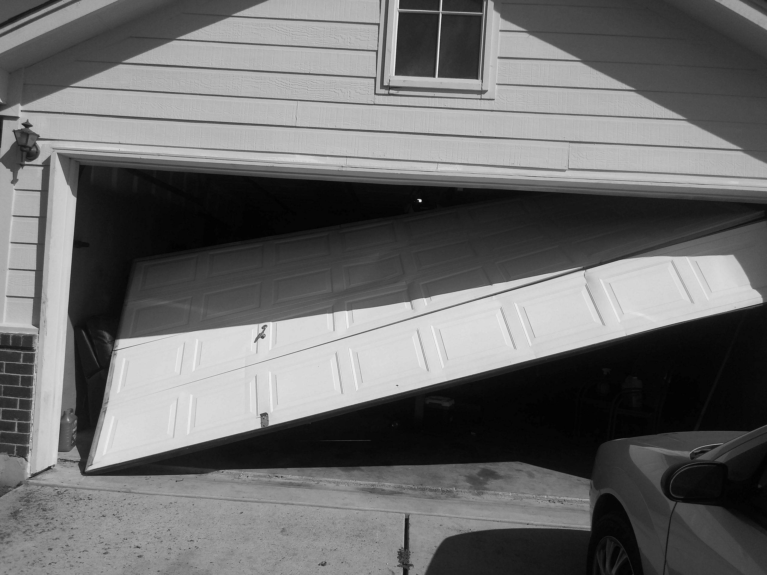 Garage door was completely off track and off the rails. near me service