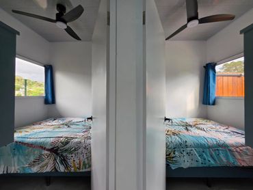 Spacious bedroom with air conditioning, closet, and tile flooring at Life’s a Beach Uvita