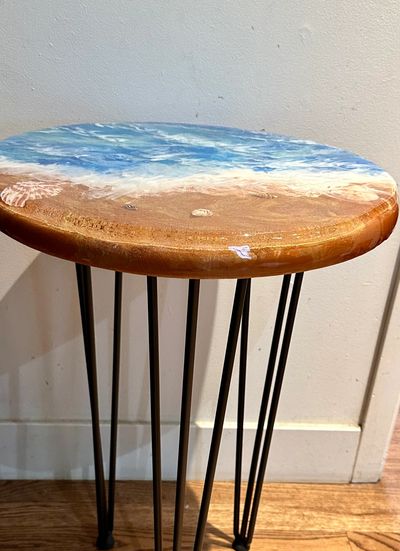 18” wood round ocean table, with acrylic and resin finish. 