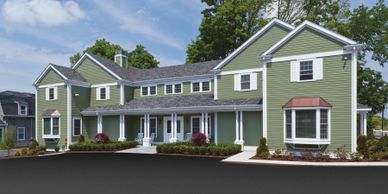 Burke Funeral Home-Exterior-Copper Hip Roof-Green Clapboards