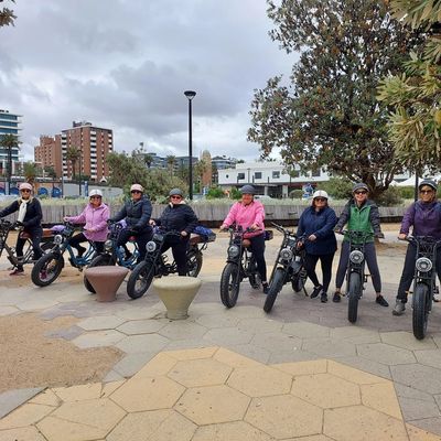 Group of 8 women on Bay Bikes E-bikes at St Kilda Pier during the St Kilda Tour.