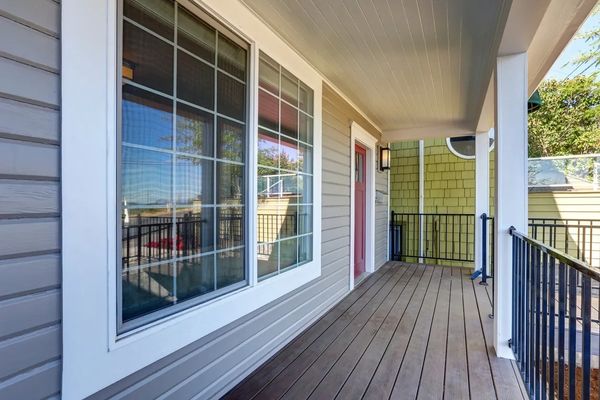 Double pane thermal vinyl window with grids.