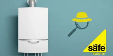 A modern white boiler with a Gas Safe Register logo on a blue wall.