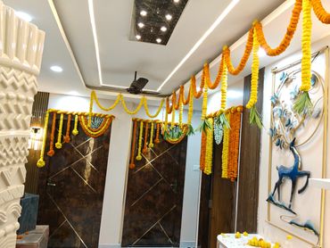 Vibrant Indoor Ceiling & Doorway Marigold Decoration