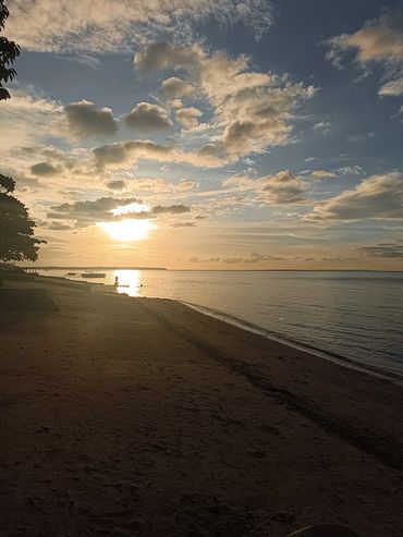 Beautiful sunset, wide pristine beachfront