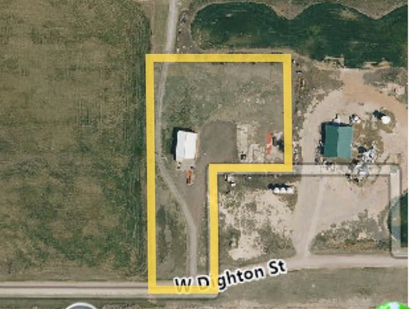Aerial view of land plot outlined in yellow on W Dighton St.