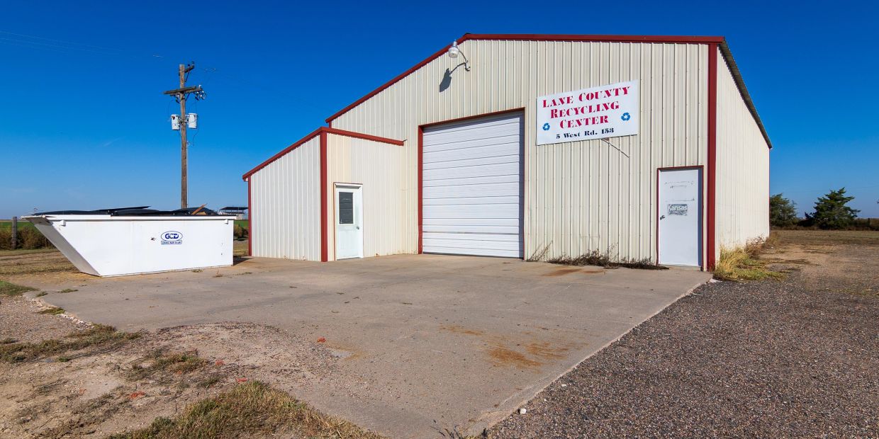 Lane County Recycling Center building under clear blue sky.