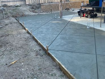 Extended concrete pad built to match existing concrete slab.