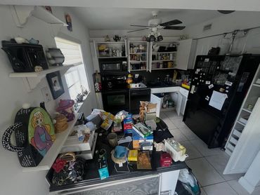 Before image of a cluttered kitchen