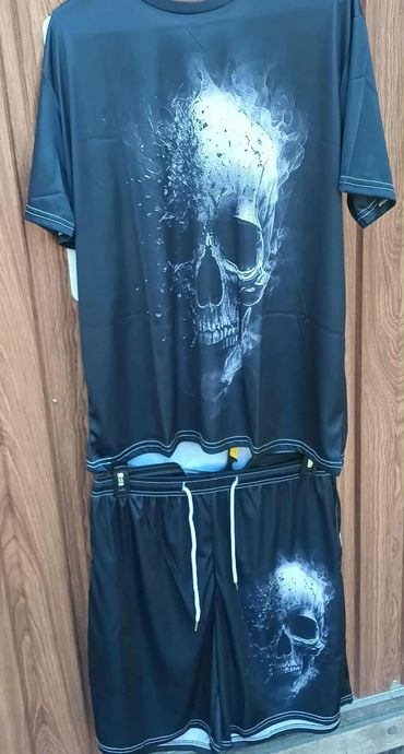 Black t-shirt and shorts set with white skull designs.