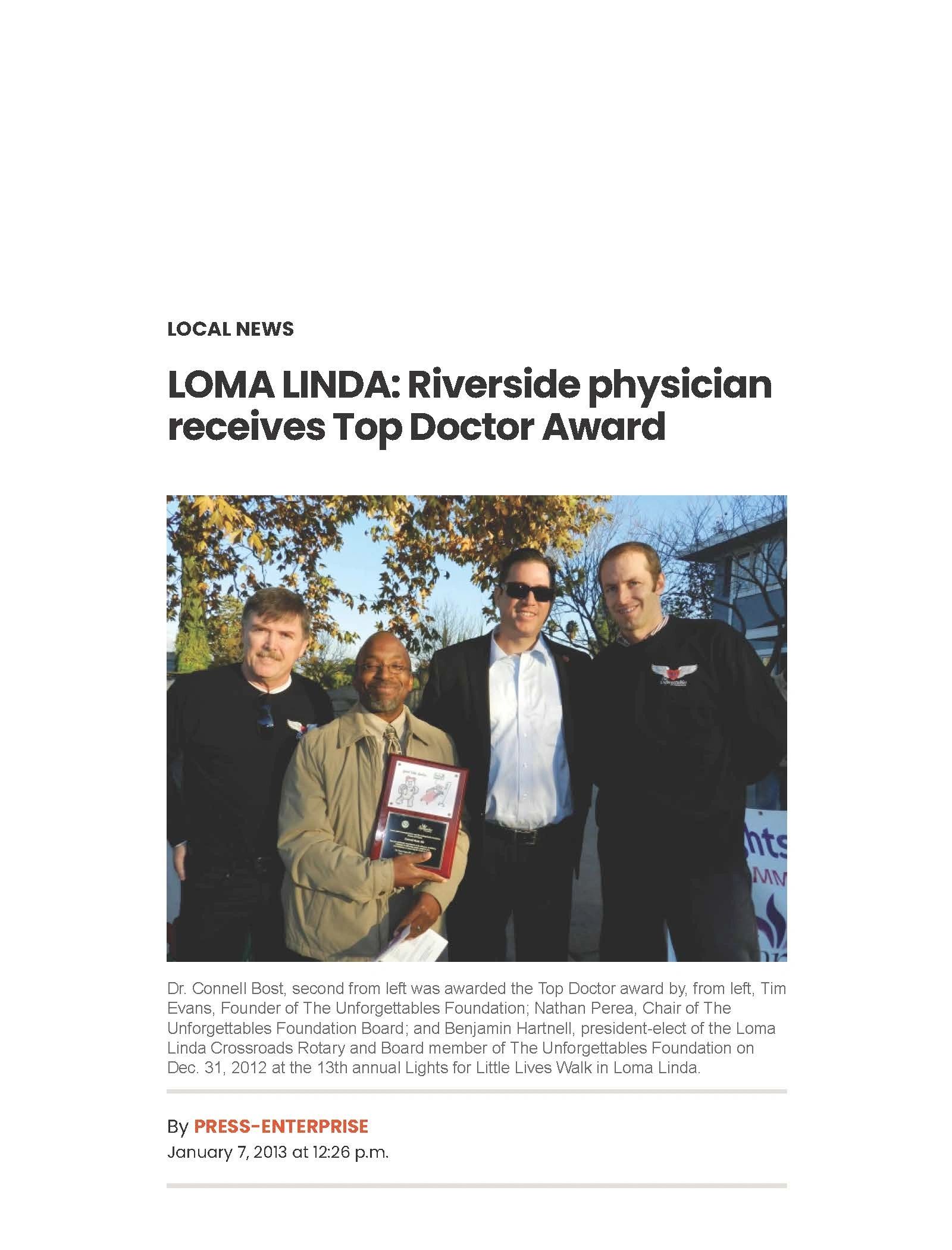Loma Linda Attorney Nathan Perea presenting award to doctor at Loma Linda