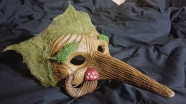 Mask made for cosplay or theater to represent Oberon on some forest god with mushroom nostrils.