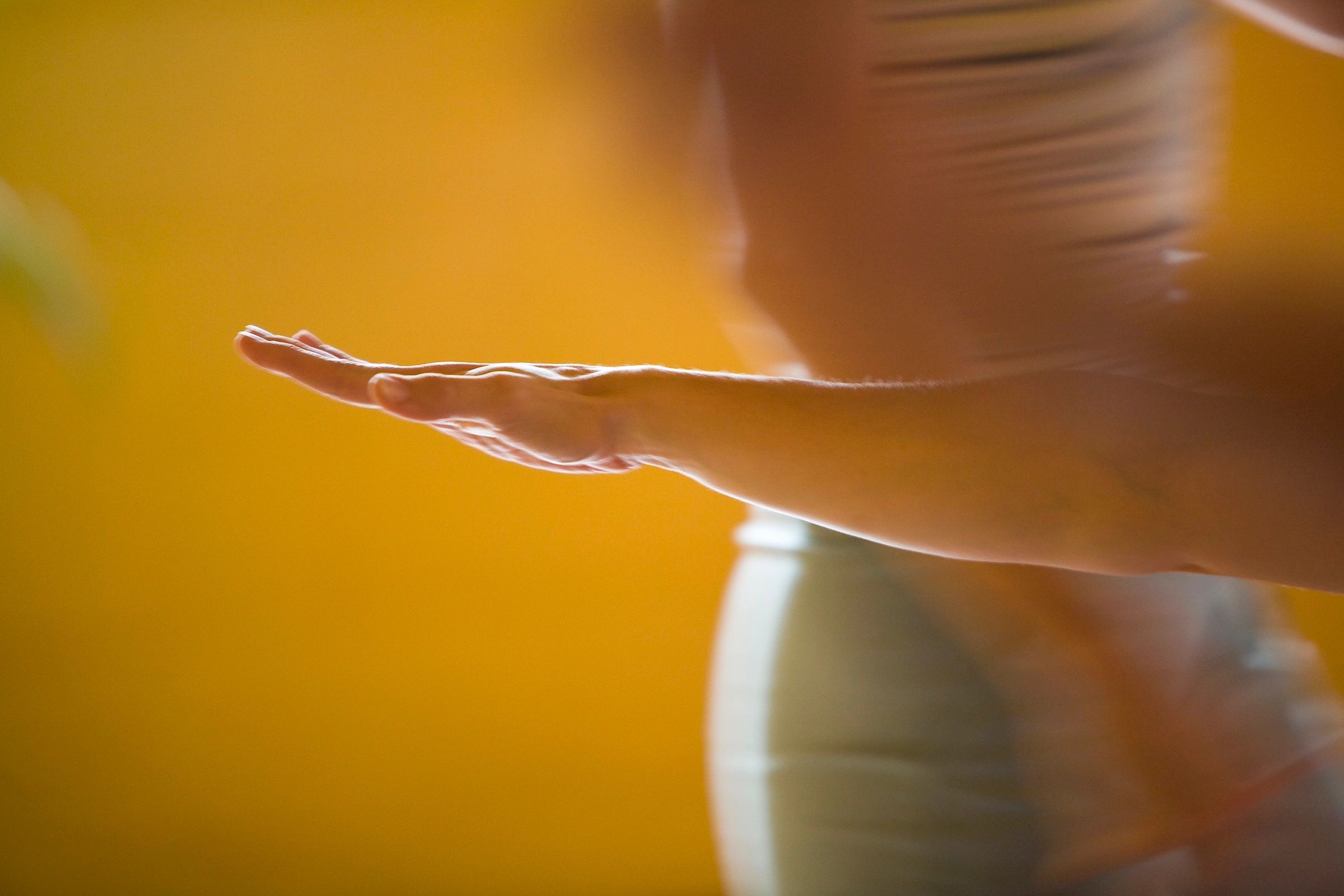 close-up of someone's arm in a yoga pose